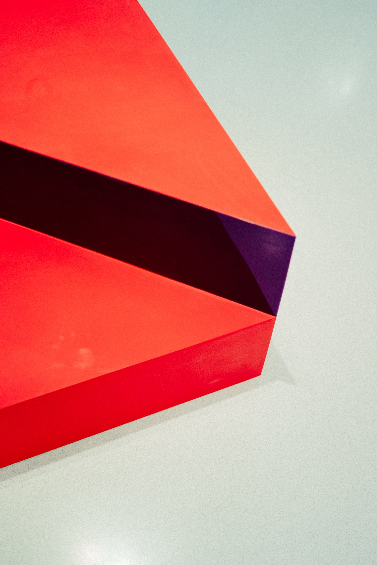 Red origami geometric sculpture