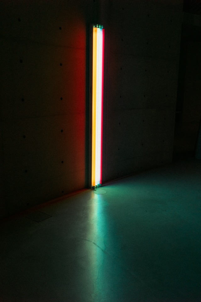 Fluorescent tubes in a dark concrete corner