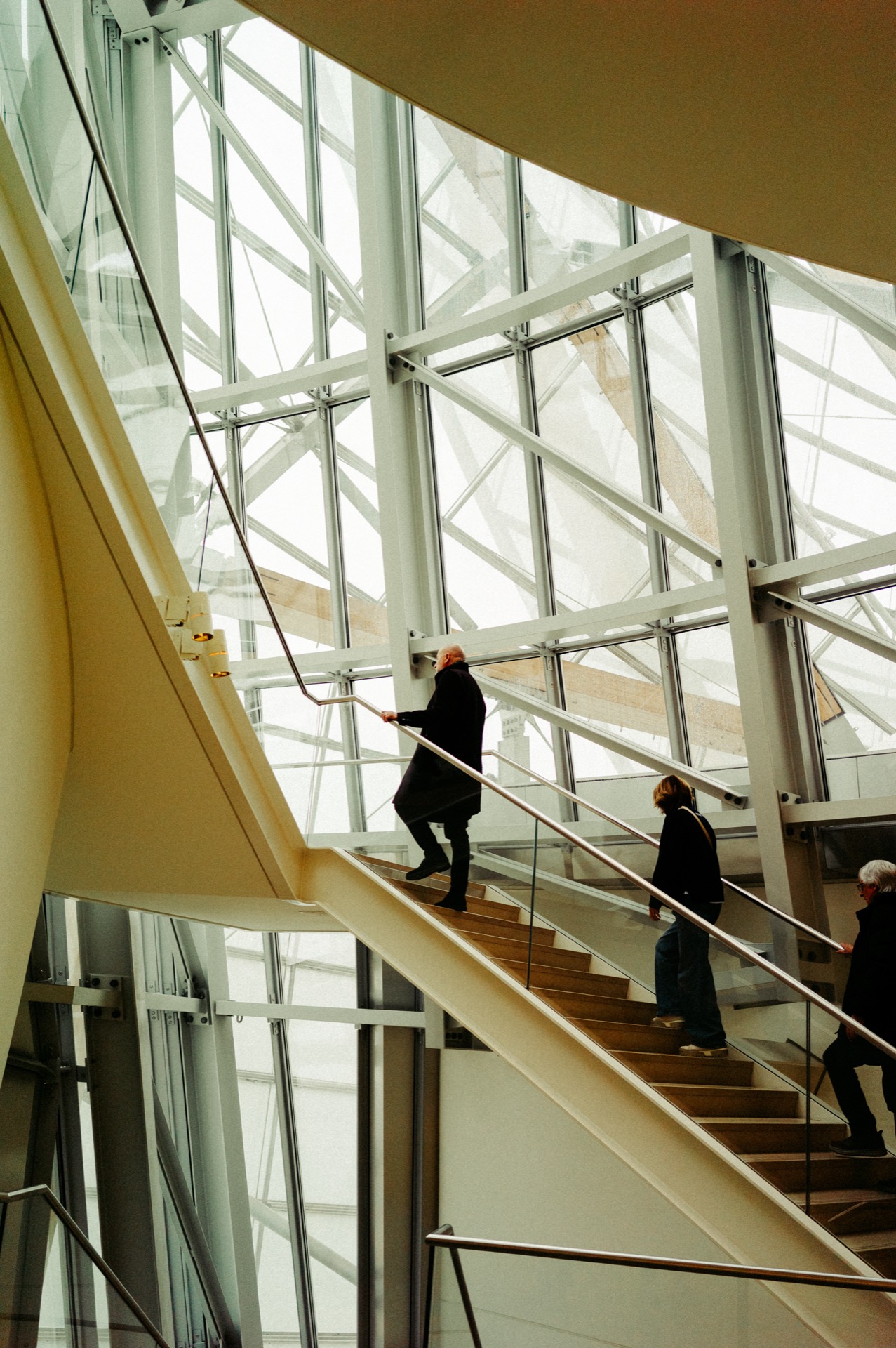 Fondation Louis Vuitton staircase and glass ceiling with figures on stairs